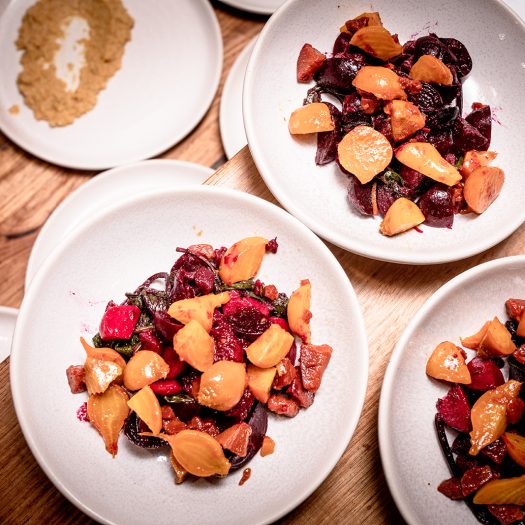 Several plates of roast beetroot